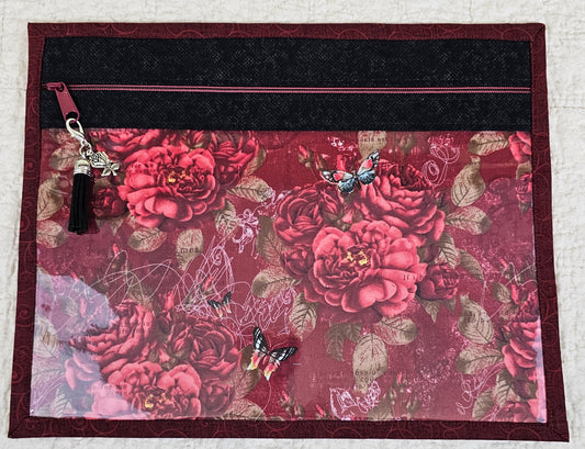 Floral Pattern on dark red fabric with black trim and maroon back 11" x 14" Project Bag